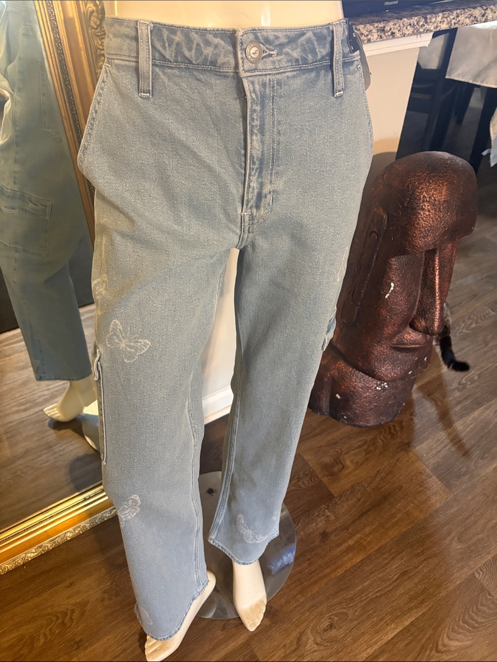Hollister Faded Light Blue Flare Jeans with Subtle Butterfly Details
